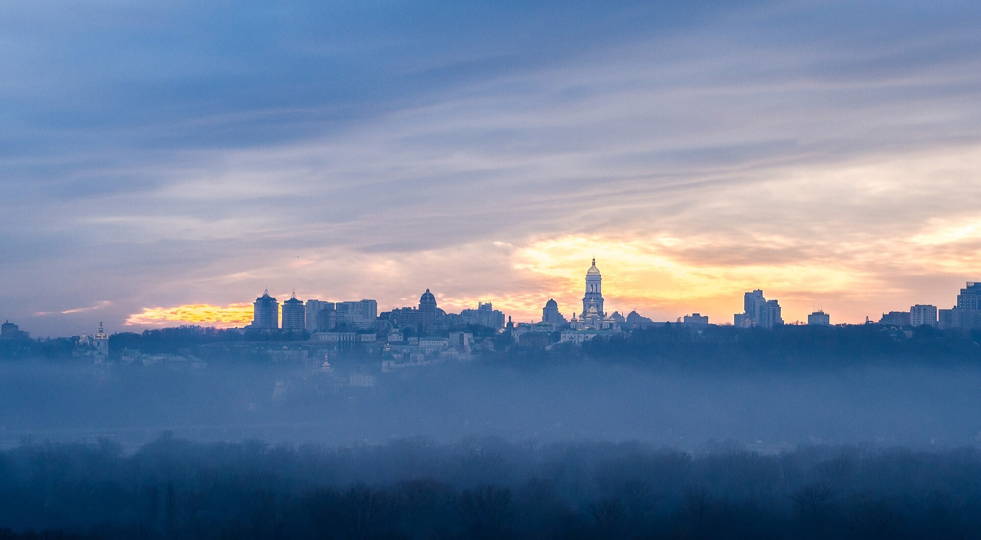 Kyiv bridge and Dnipro River skyline representing Ukrainian capital infrastructure